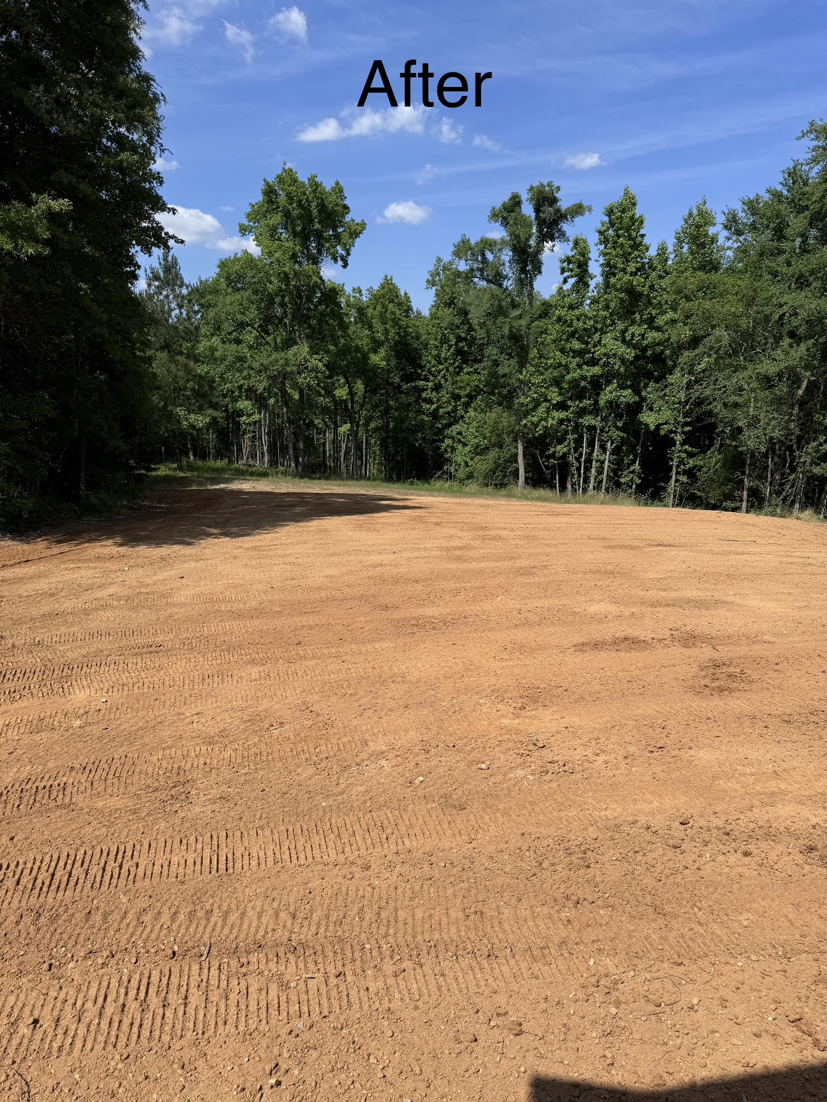 Level area of cleared, graded dirt surrounded by trees under a blue sky, with the word After at the top of the image.